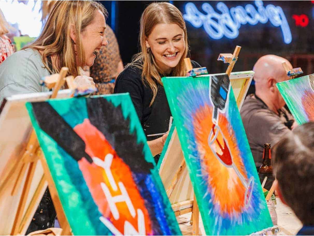 Collaborative artworks paint and sip