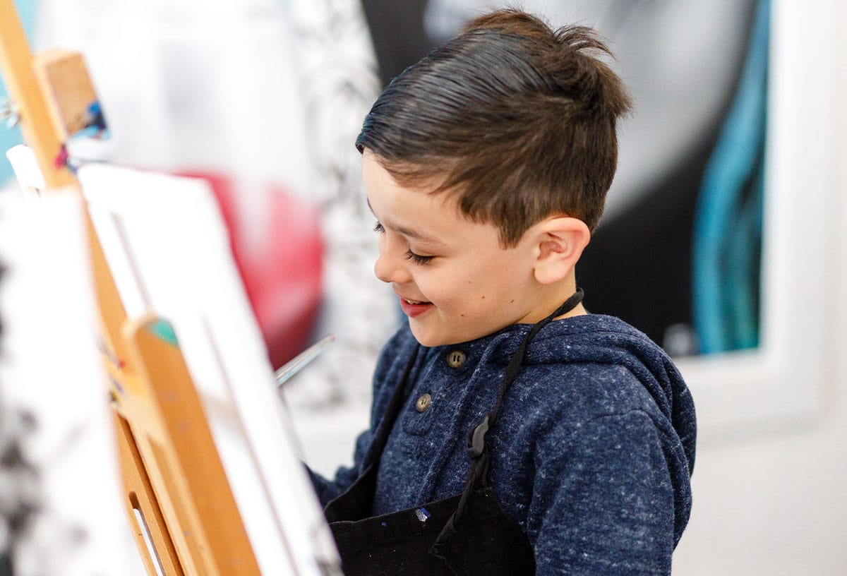 School holiday ideas Brisbane include a paint and sip kids art class at Pinot & Picasso