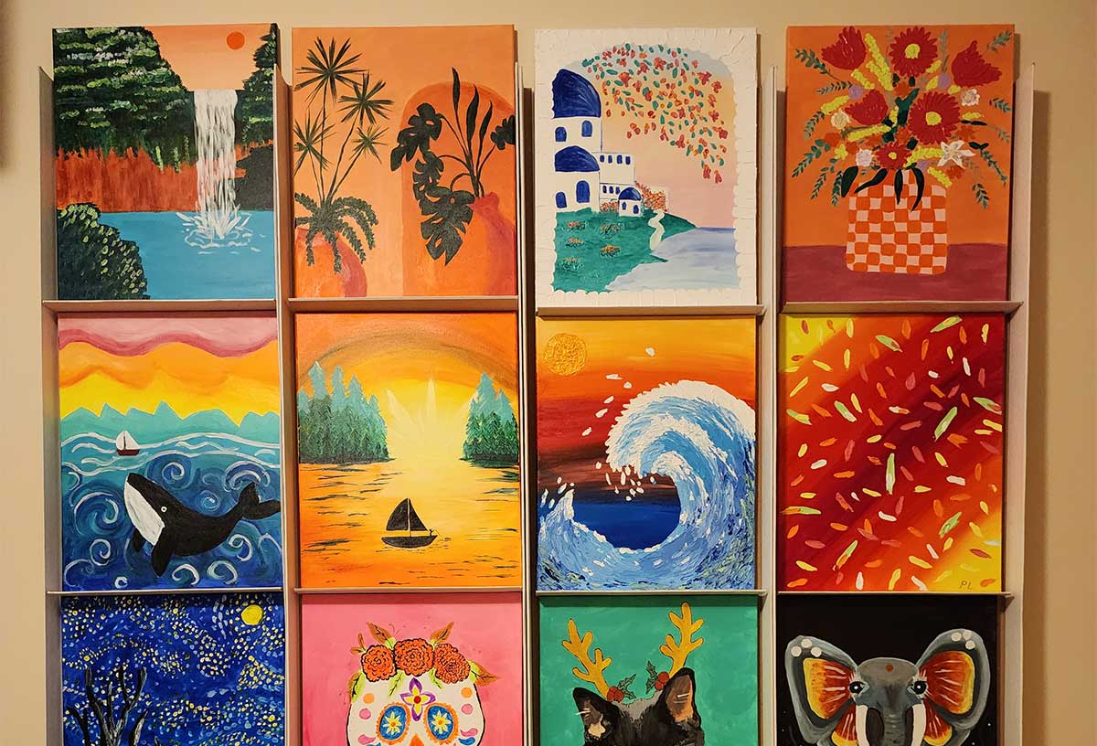 Patrina's impressive artwork wall at her home