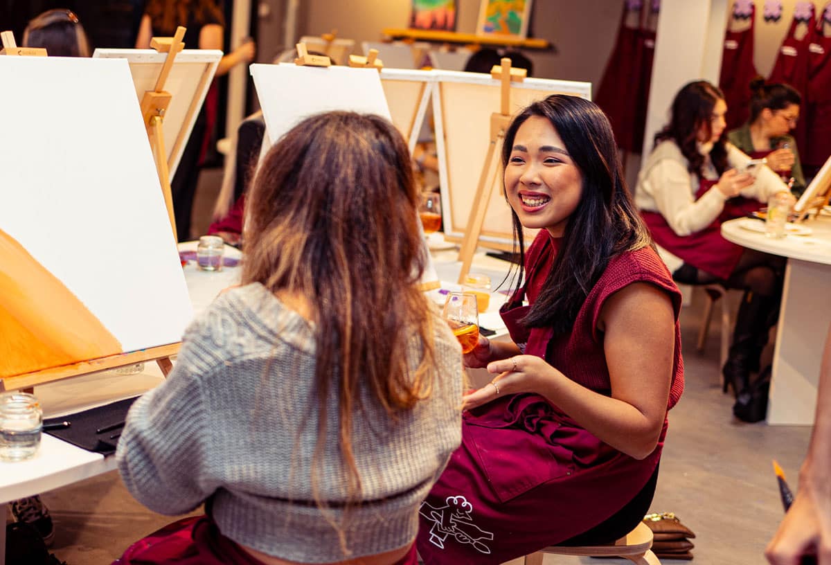 Team building ideas Melbourne include a paint and sip session at Pinot and Picasso