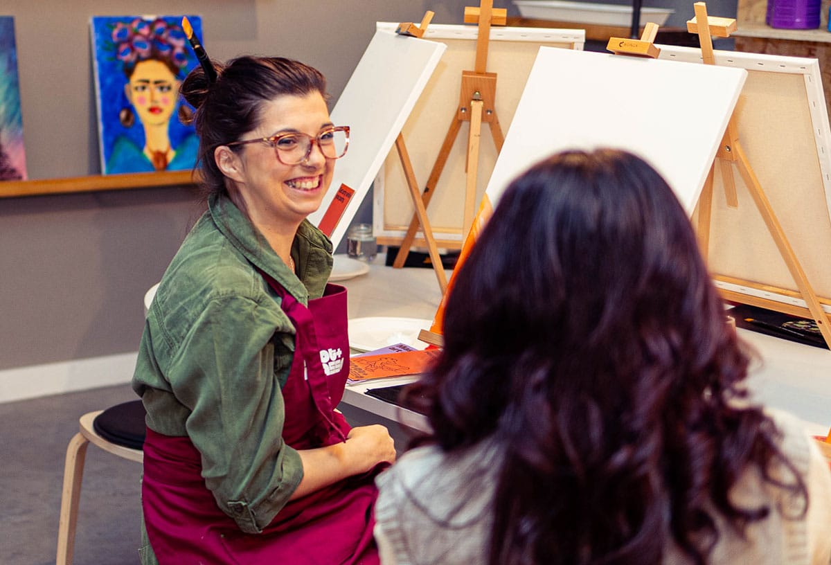 Team building ideas Brisbane include a paint and sip class at Pinot and Picasso