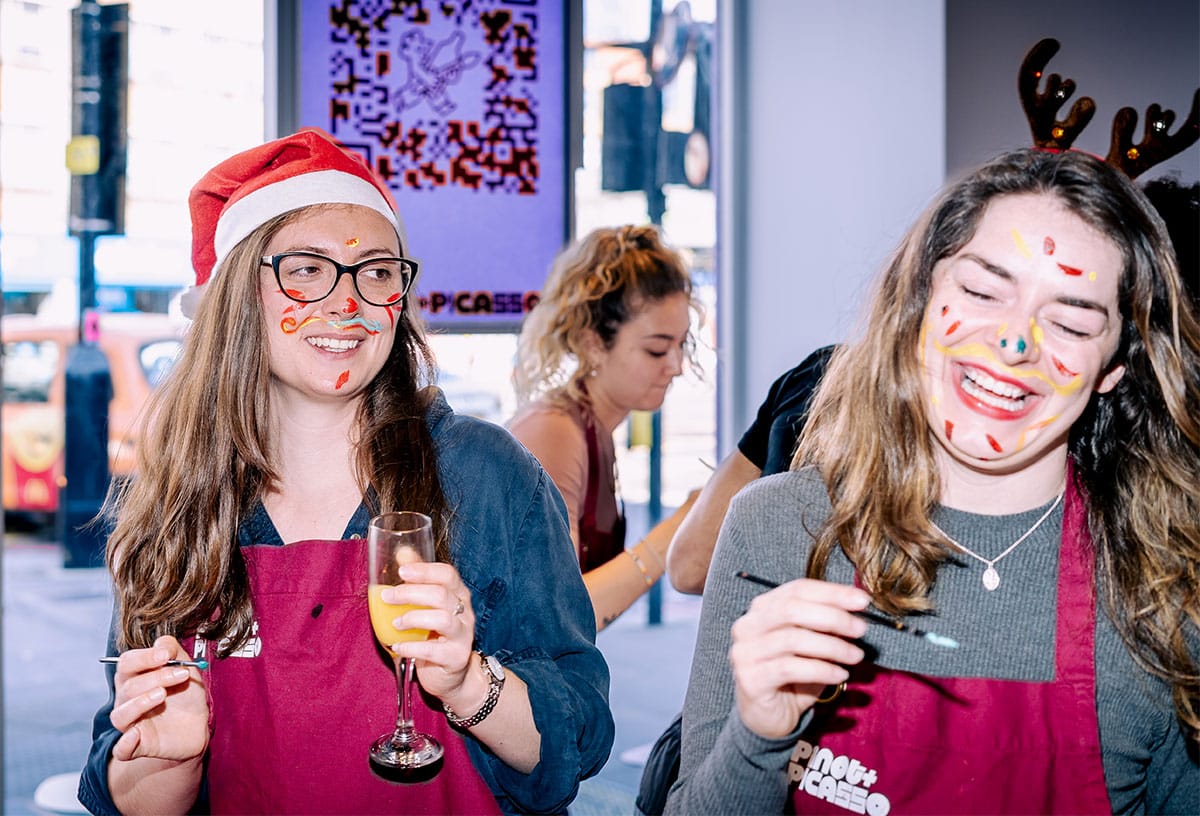 Work Christmas party ideas Melbourne include a paint and sip event at Pinot and Picasso